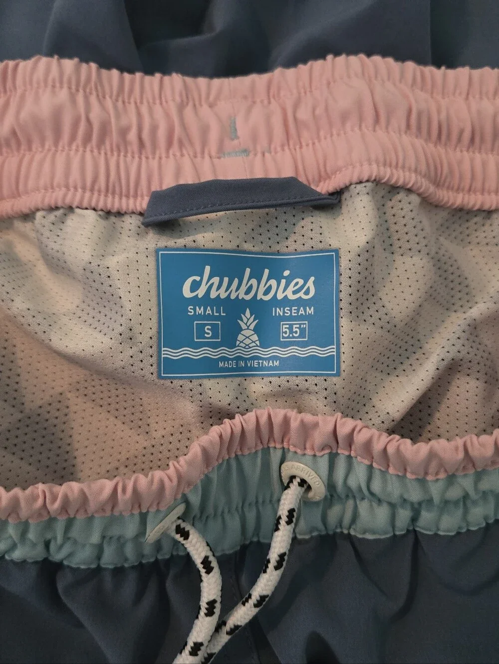 chubbies Blue Swim Trunks with Pink and Light Blue Waistband